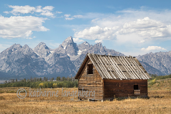 Rustic building and GrandTeton Range