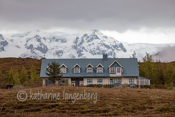 snow covered mountain and guesthouses